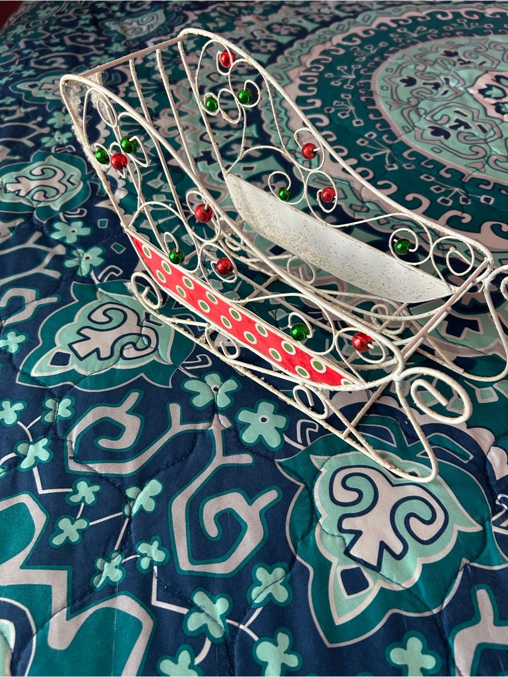 White Decorative Wire Sleigh with Red and Green Accents
